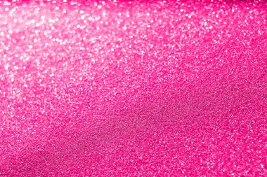 Parlak soyut parıltı dokusu dinamik tasarımı olan pembe arkaplan 