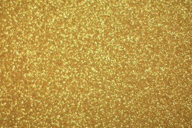 Parlak soyut parıltı dokusu dinamik tasarımı olan altın arkaplan