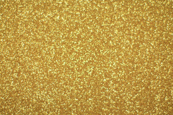 Bright abstract glitter texture gold background with dynamic design