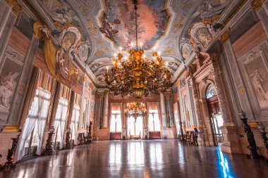 VENICE, ITALY, APRIL 22, 2018 : interiors decor, ceilings and frescoes of Ca'Rezzonico palace, april 22, 2018,  in Venice, italy clipart