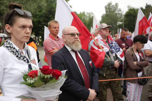 Oswiecim, Auschwitz, Poland - June 14, 2020: Independence March of right-wing communities on the 80th anniversary of the first transport of Polish prisoners to Auschwitz