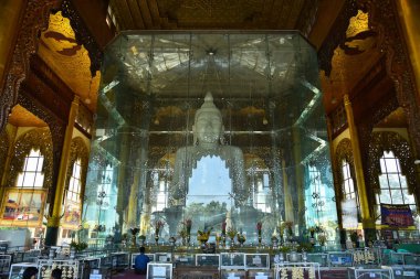 Yangon,Myanmar - December 15,2016 :  Kyauk Daw Kyi or Big marble buddha image,This temple is enshrined of the marble Buddha located near airport in Yangon,Myanmar. clipart