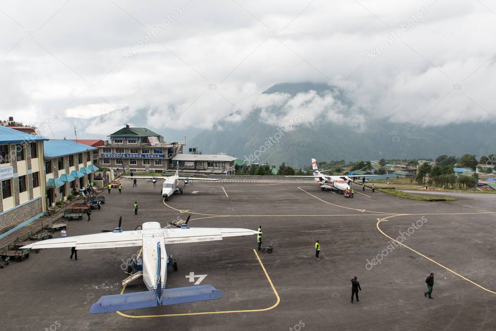 Passengers get off from Summit Air at Lukla airport ,Lukla airport is one of the most dangerous airport in the world.