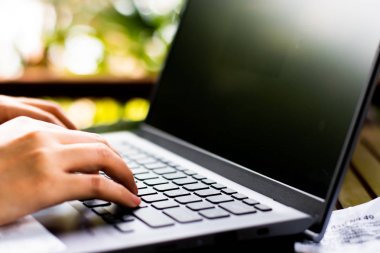 Women using laptop computer at cafe