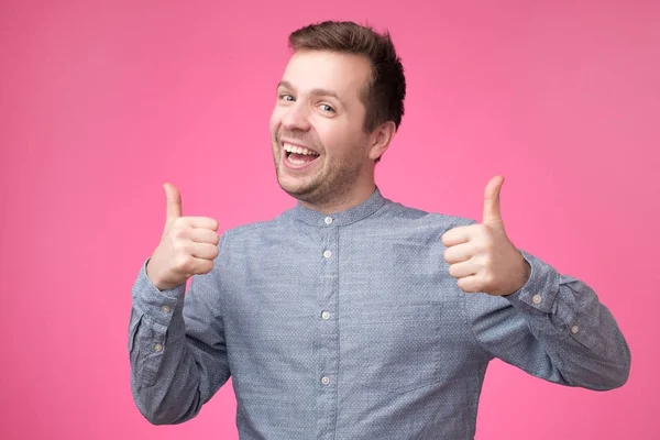 Young Attractive Man Dressed Blue Shirt Standing Pink Background Looking — 스톡 사진