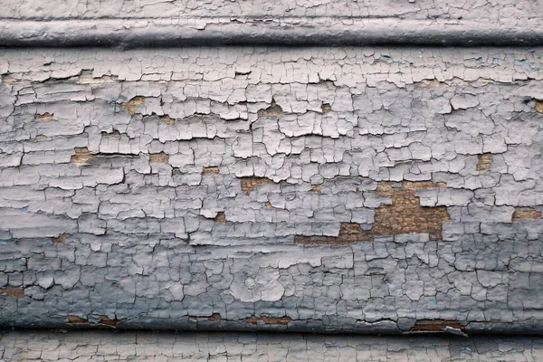 Close up view of wooden fence with old weathered pain. Grunge background — Stock Photo, Image
