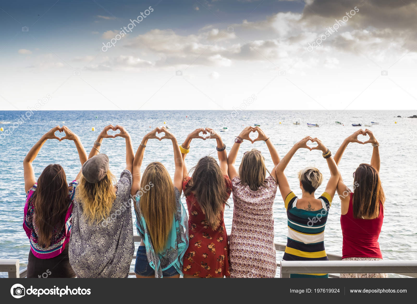Beautiful Seven Girls Backside Doing Heart Hands Looking Ocean ...