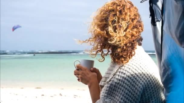 Woman Curly Hair Sitting Beach Cup Coffee — Stock Video