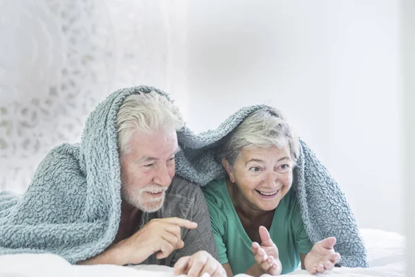 Aged Couple Lying Bed Plaid Having Fun — Stock Photo, Image