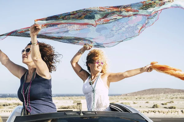 Couple Women Have Fun Play Wind Standing Out Top Convertible — Stock Photo, Image