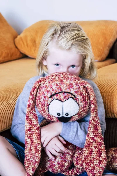 Sad Young Child Boy Blonde Hair Hug His Puppy Home — Stock Photo, Image