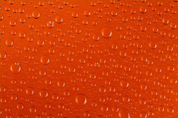 Clear Water Drops Transparent Light Reflection Colored Background Orange — Stock Photo, Image