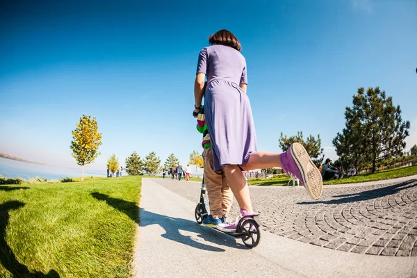 Woman Riding Her Son Scooter Boy His Mother Riding Park — Stock Photo, Image