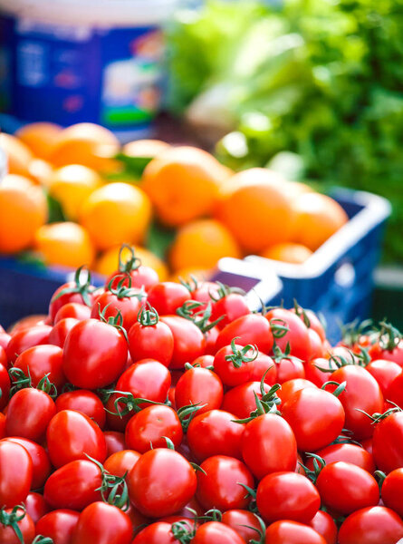 Ripe tomatoes on the counter.