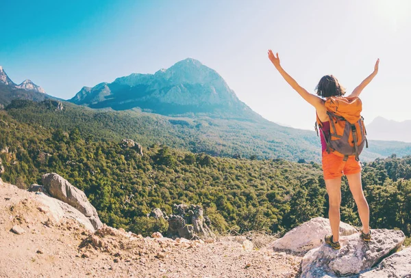 Girl at the top of the mountain.