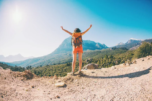 Girl at the top of the mountain.