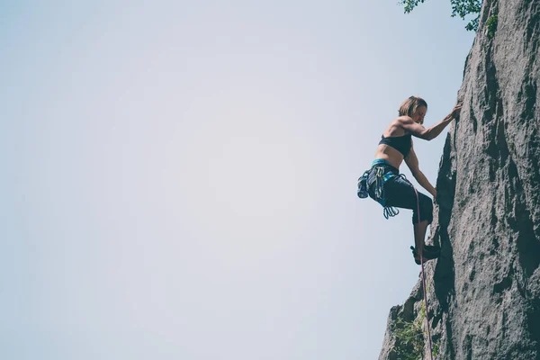 Woman engaged in extreme sport.