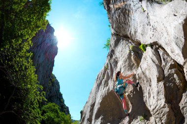 Rock climbing and mountaineering in the Paklenica National Park.  clipart