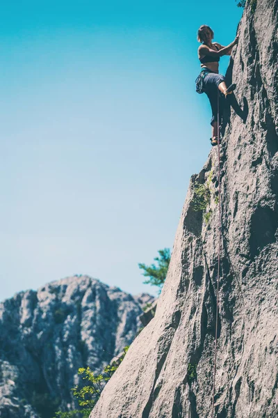 Woman engaged in extreme sport.