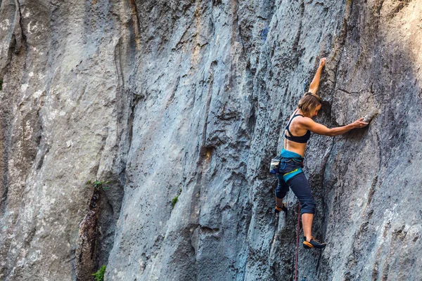 Woman engaged in extreme sport.