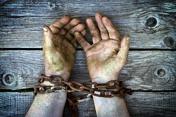Dirty Male Hands Chained Old Rusty Thick Chain Wooden Boards — Stock Photo, Image