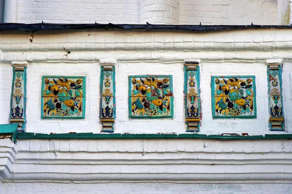 Amazing ancient decorative ceramic tales on the wall of the russian Joseph-Volotsky monastery