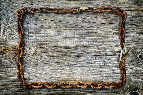 Tło Stary Zardzewiały Łańcucha Leżącego Chropowatej Powierzchni Drewnianych Kształcie Prostokąta — Zdjęcie stockowe