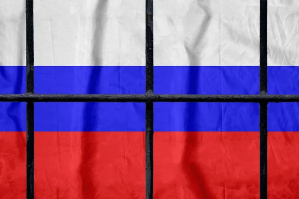 Ρωσική σημαία πίσω από τα μαύρα Μεταλλικά κάγκελα της φυλακής — Φωτογραφία Αρχείου