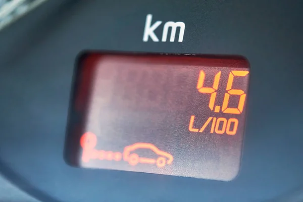 Low fuel consumption showed by the car on-board computer on the dashboard