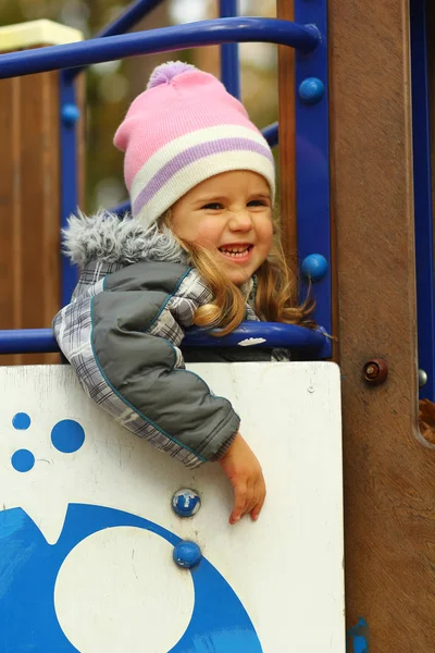 Portrait Funny Toddler Girl Playground Autumn Park Looking Distance Laughing — Stock Photo, Image