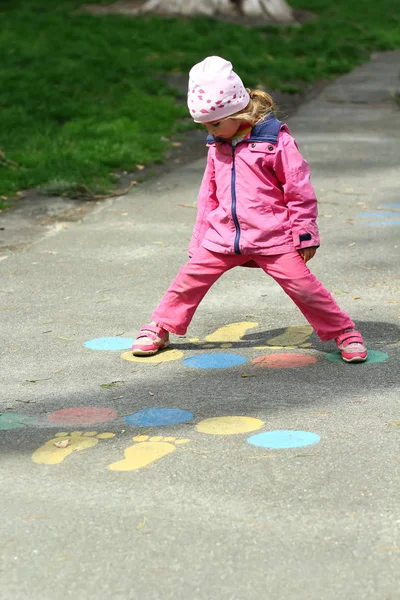 Three Year Old Girl Jumping Playing Hopscotch Park — Stock Photo, Image
