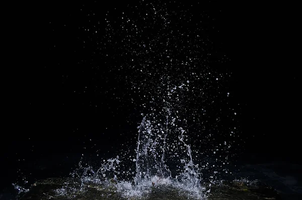 Splashing wave on the Black sea in the night.