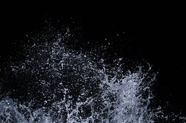 Splashing wave on the Black sea in the night.