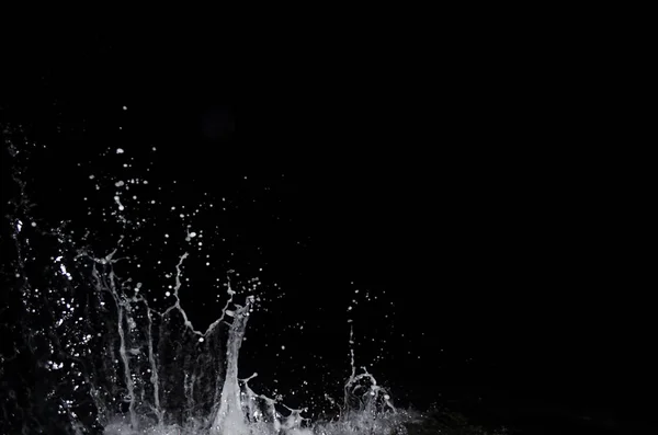 Splashing wave on the Black sea in the night.