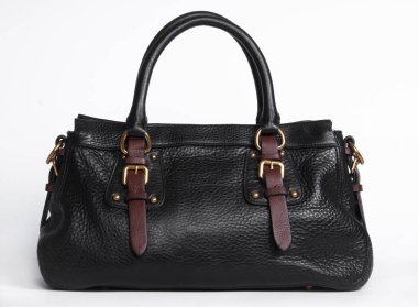 Kadının çantası bırakarak gölge beyaz yüzeyi izole