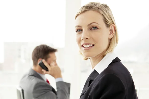 Corporate Businesswoman Looking Camera Businessman Phone Background Business Negotiation — Stock Photo, Image