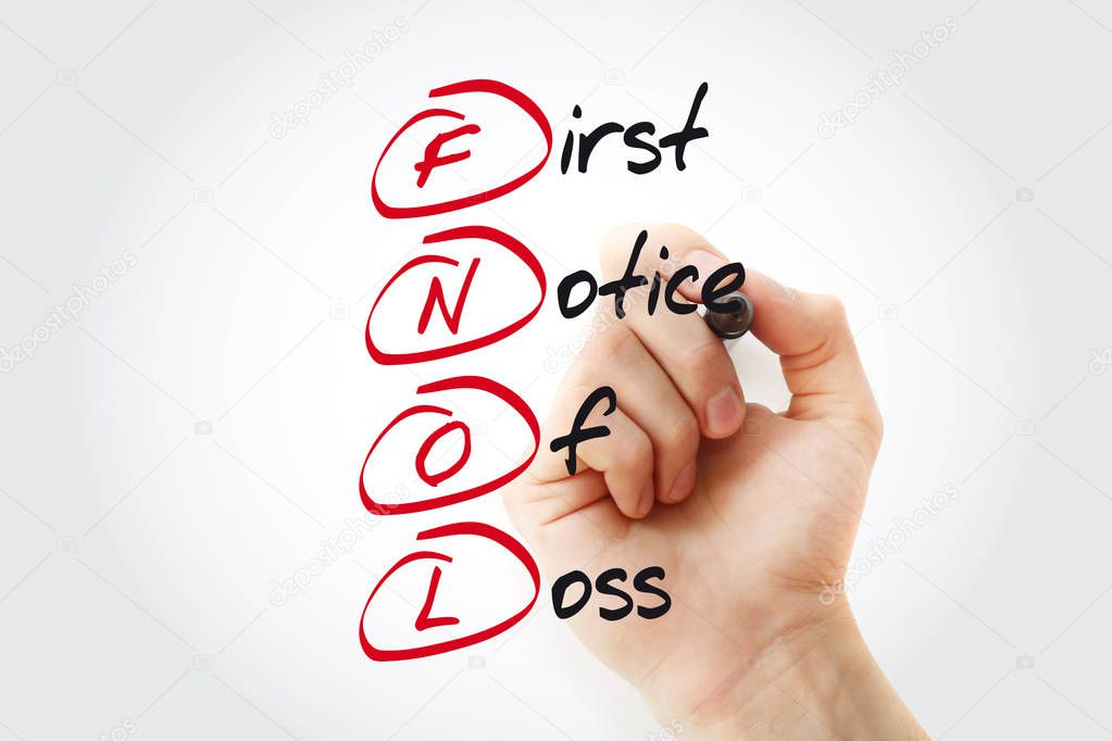 Hand writing FNOL - First Notice Of Loss with marker, acronym business concept