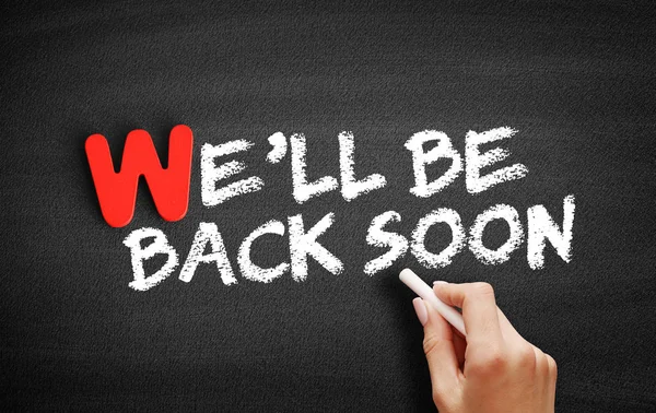 We\'ll Be Back Soon text on blackboard