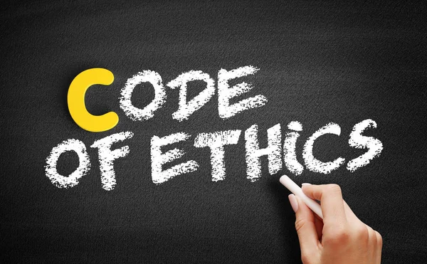 Code of Ethics text on blackboard — Stock Photo, Image