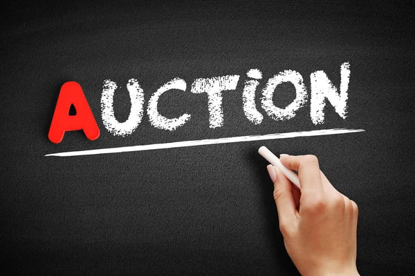 Auction text on blackboard — Stock Photo, Image