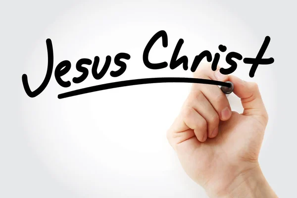 Mão escrevendo Jesus Cristo com marcador — Fotografia de Stock