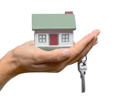 Bir Model ev ve anahtarları tutan el