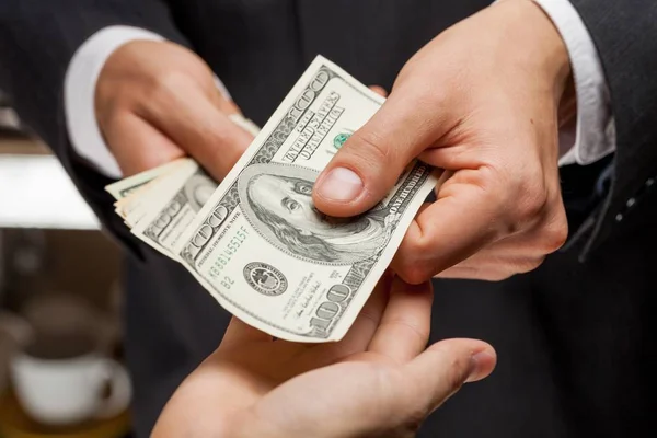 Closeup of Two Business People Giving Money — Stock Photo, Image