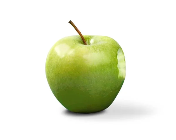 Ett grönt äpple med en bit — Stockfoto