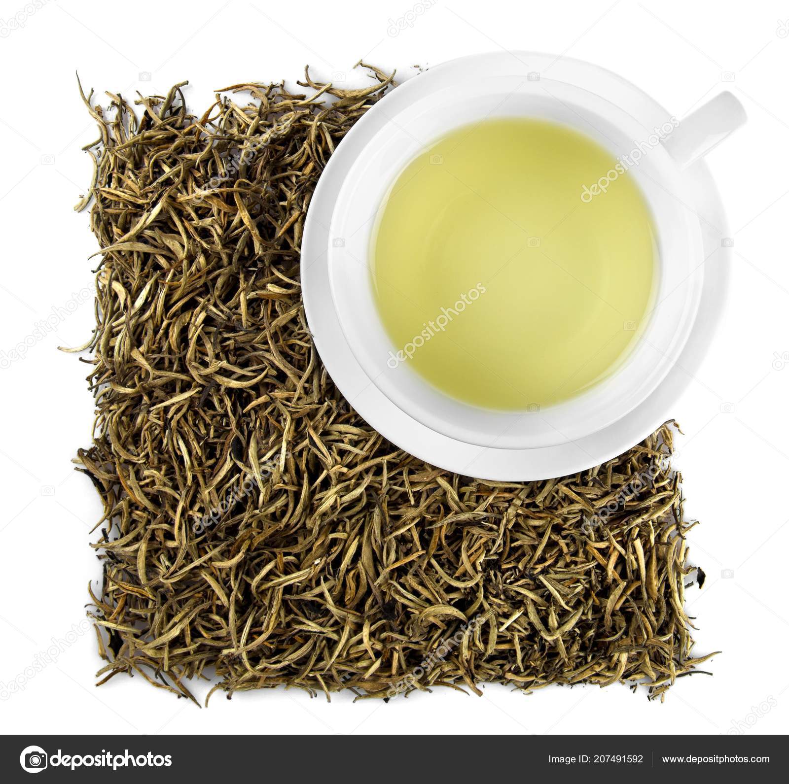 Cup of White Tea with Dried White Tea Leaves Top View Stock Photo by
