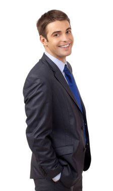 Elleri ceplerinde mutlu genç işadamı