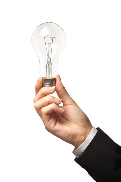 Крупный план предпринимателя, держащего лампочку — стоковое фото
