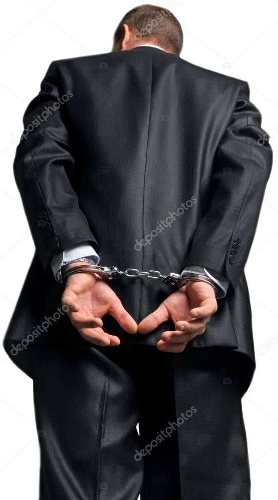 Bottom View of Businessman in Handcuffs