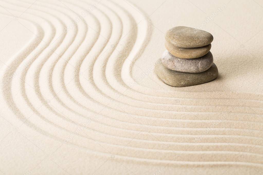 close-up view of Zen stones in the sand