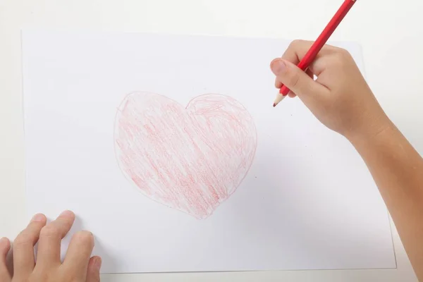 Child Drawing Red Heart Symbol — Stock Photo, Image